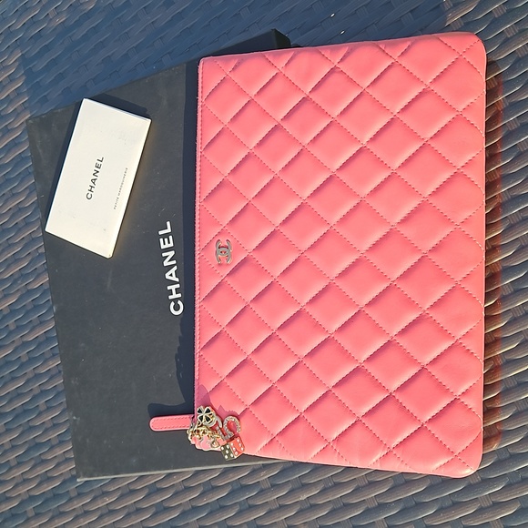 CHANEL Handbags - CHANEL Quilted Pink Clutch O Case Vegas Charm Pull w/Box
